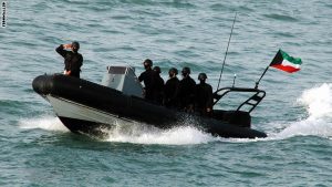 Kuwaiti navy men take part in a military